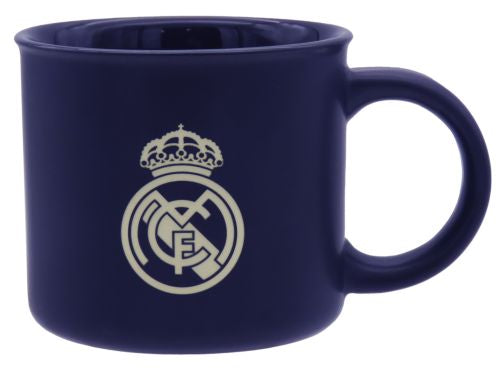 Taza de cerámica azul del Real Madrid con escudo blanco en caja